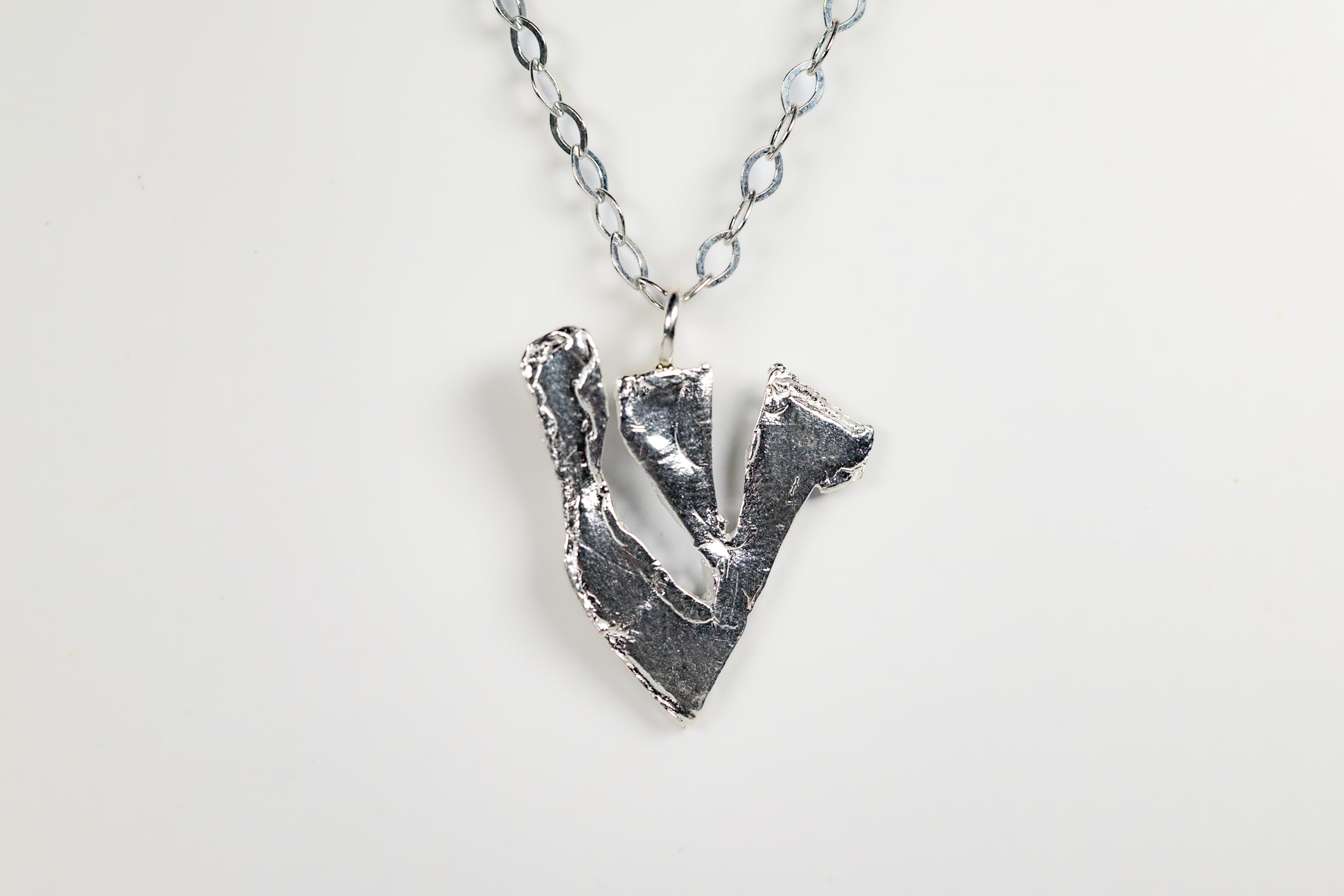 Sterling Silver Shin Pendant Necklace